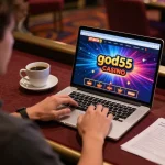 Engaging with god55 casino online gameplay on a laptop, showcasing strategic decision-making.